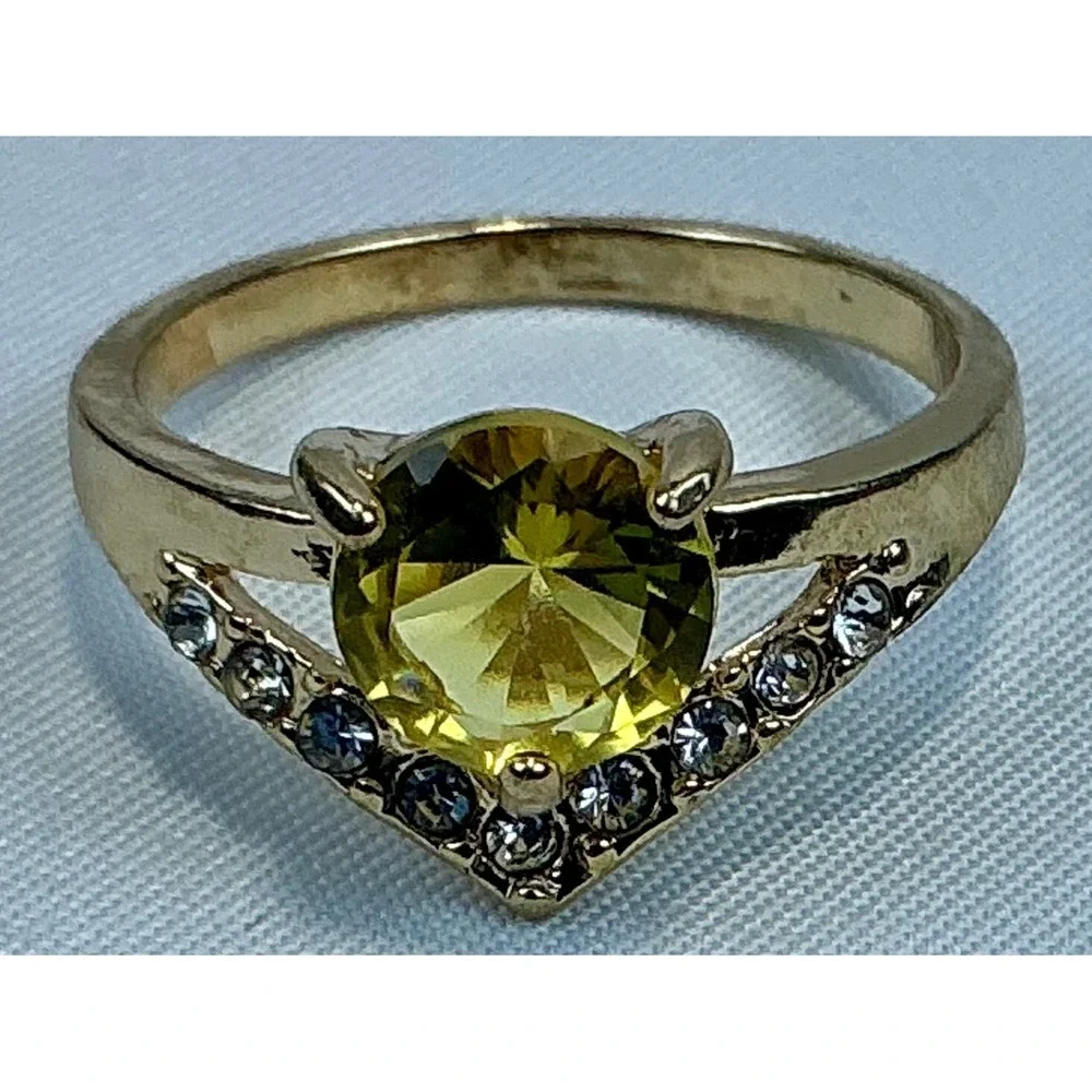 Gold Tone Ring with Yellow Stone and Simulated Diamonds Costume Jewelry Size 8.5